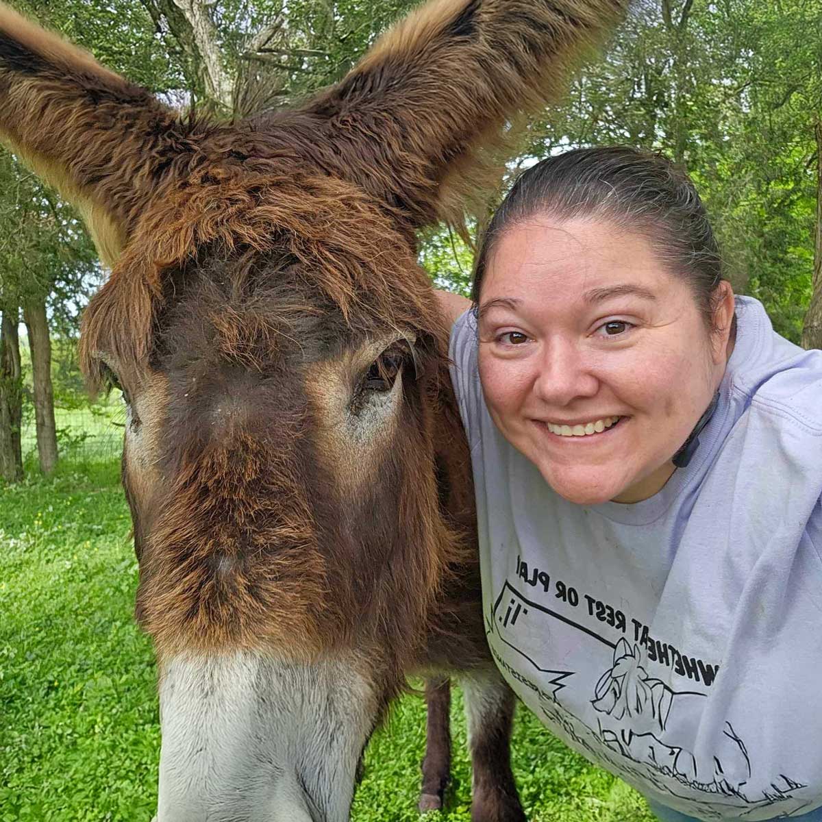 volunteer with donkey