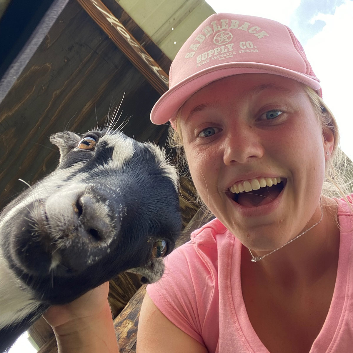 Volunteer with Goat